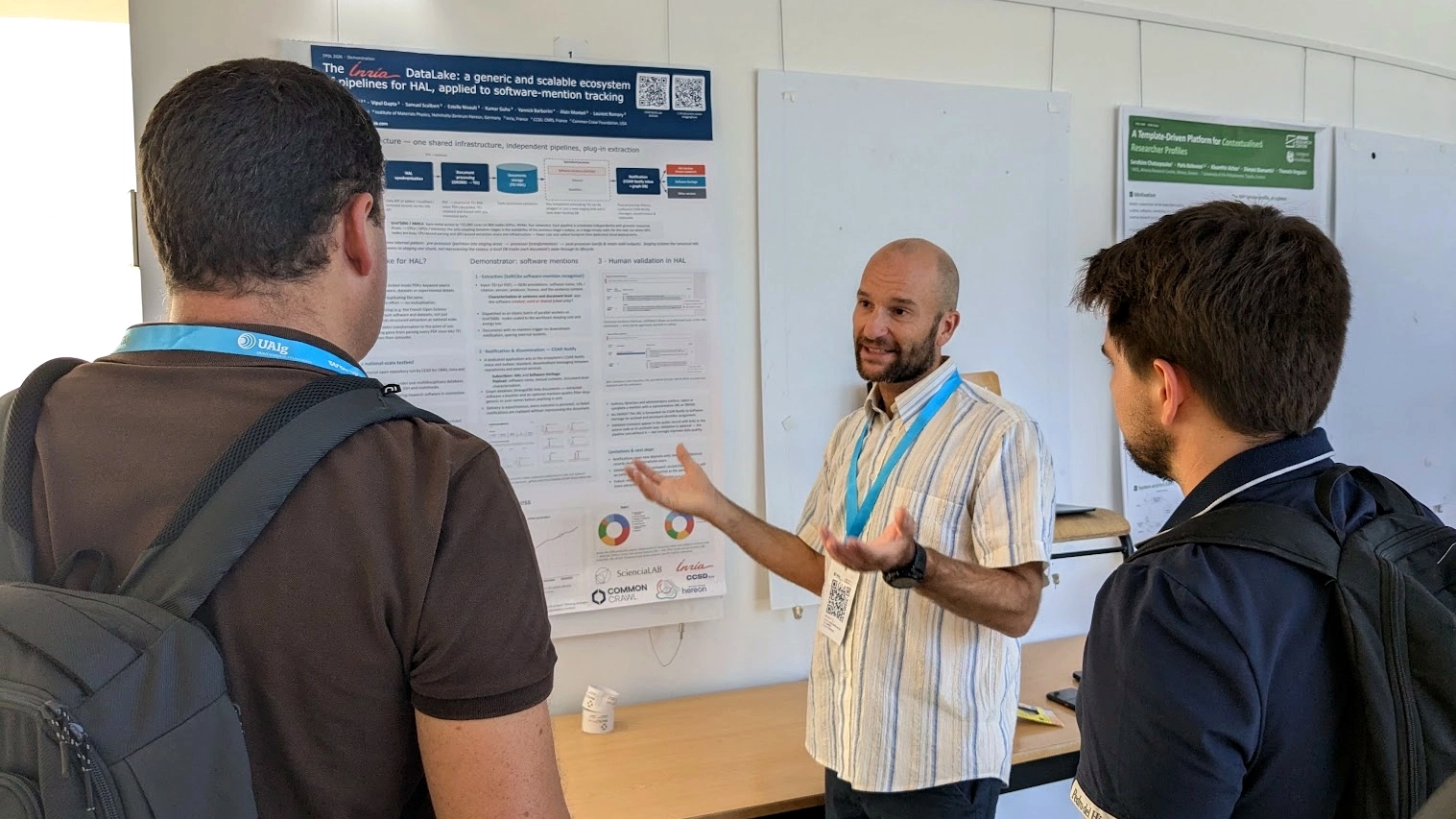 A photo of Luca Foppiano demonstrating the paper "The INRIA DataLake: A Generic and Scalable Ecosystem of Pipelines for HAL Applied to Software Mentions Tracking"