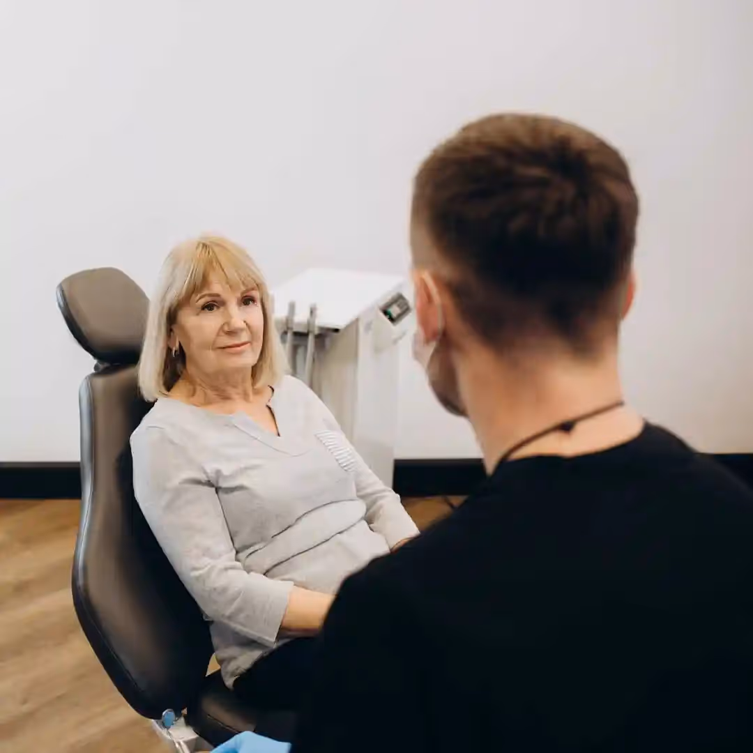 A woman in a denture consultation.
