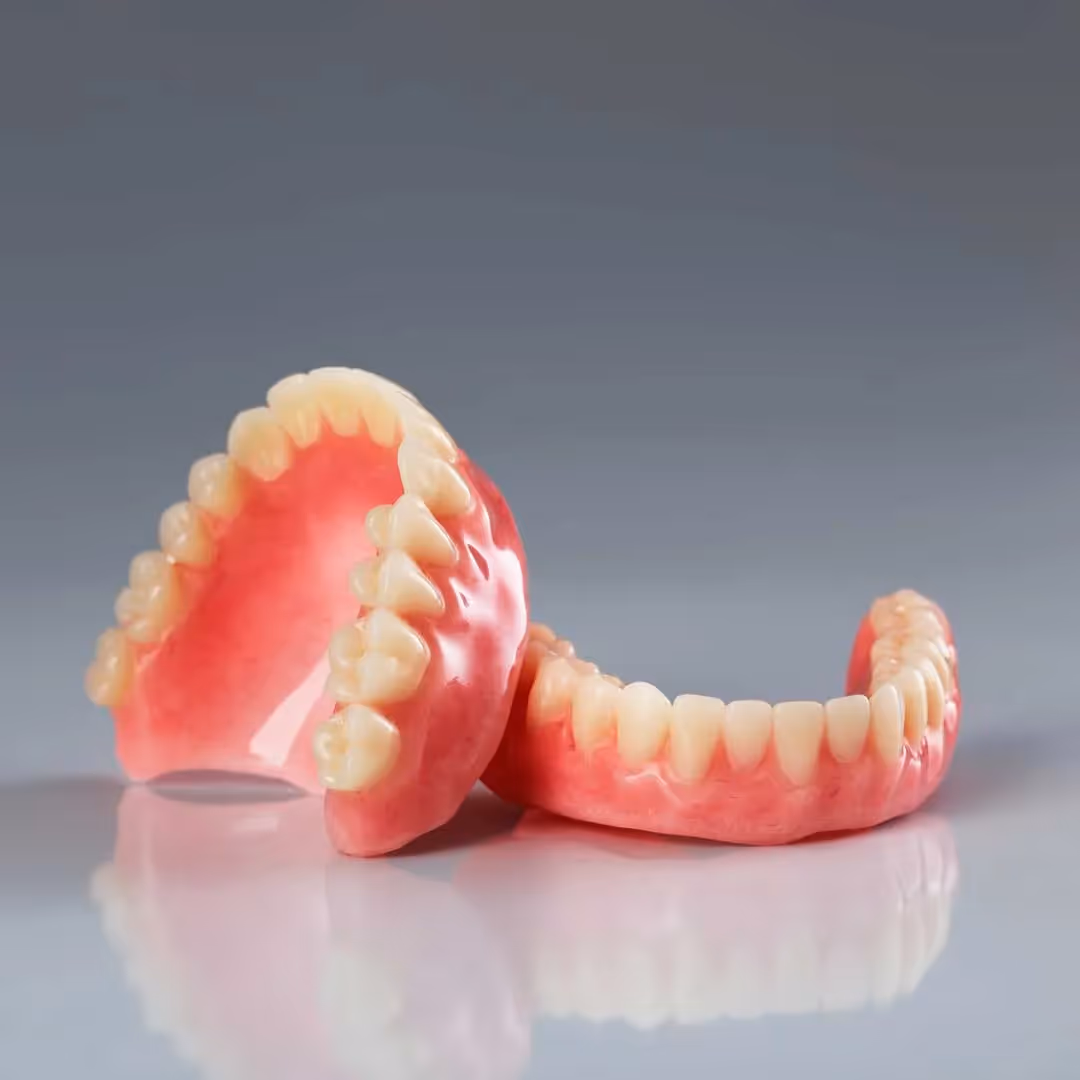 A pair of full-dentures
