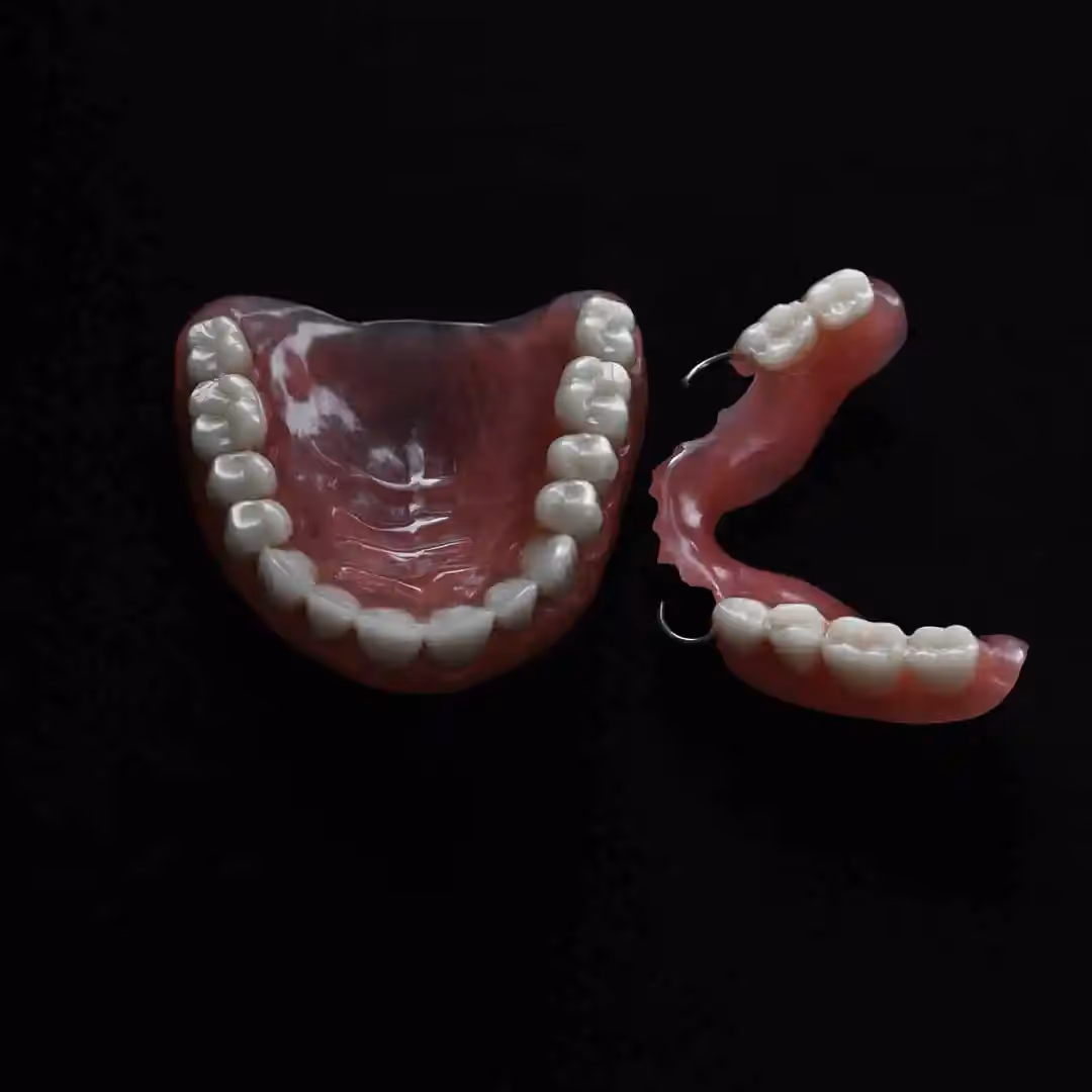 A set of dentures on black background