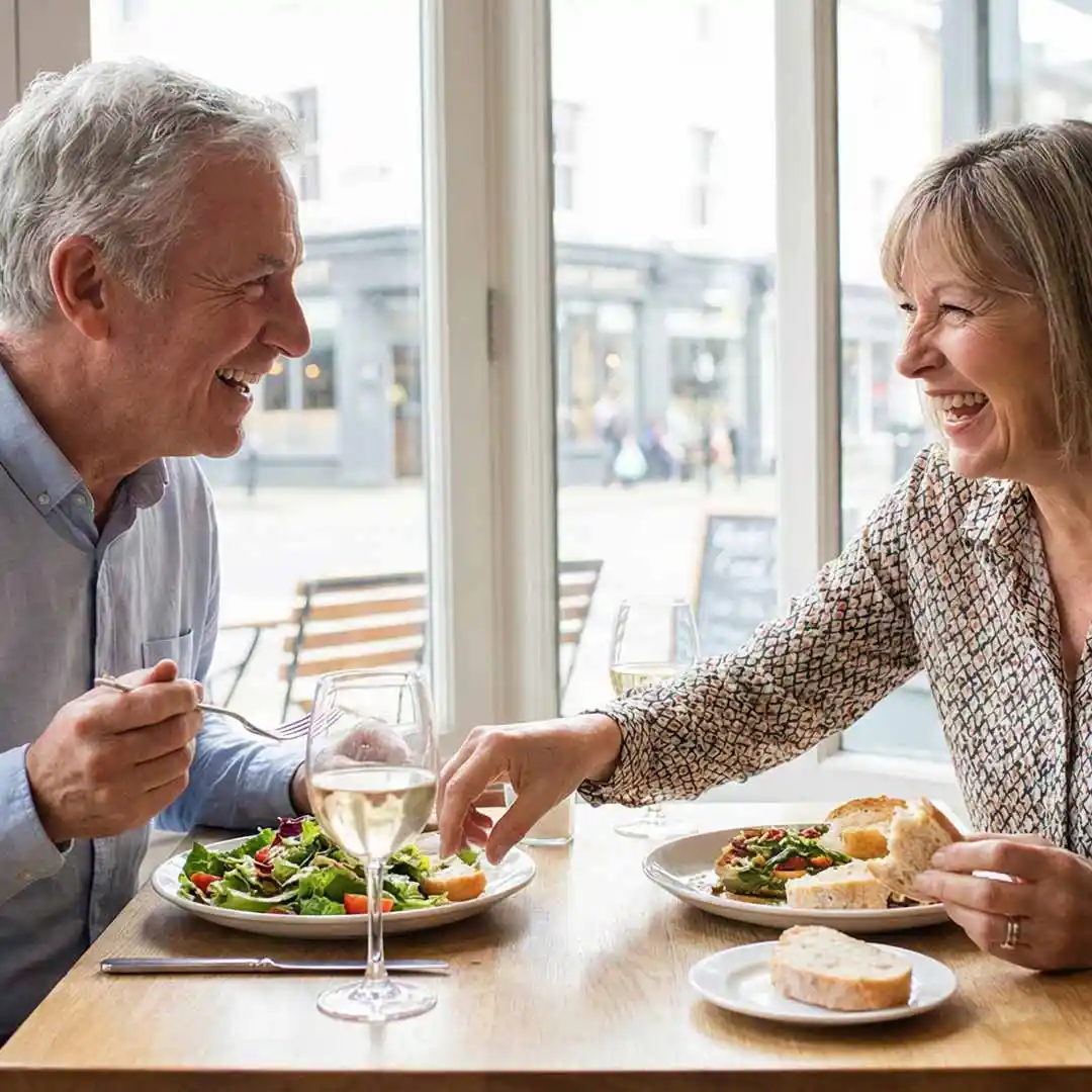 Couple enjoying a meal together. 