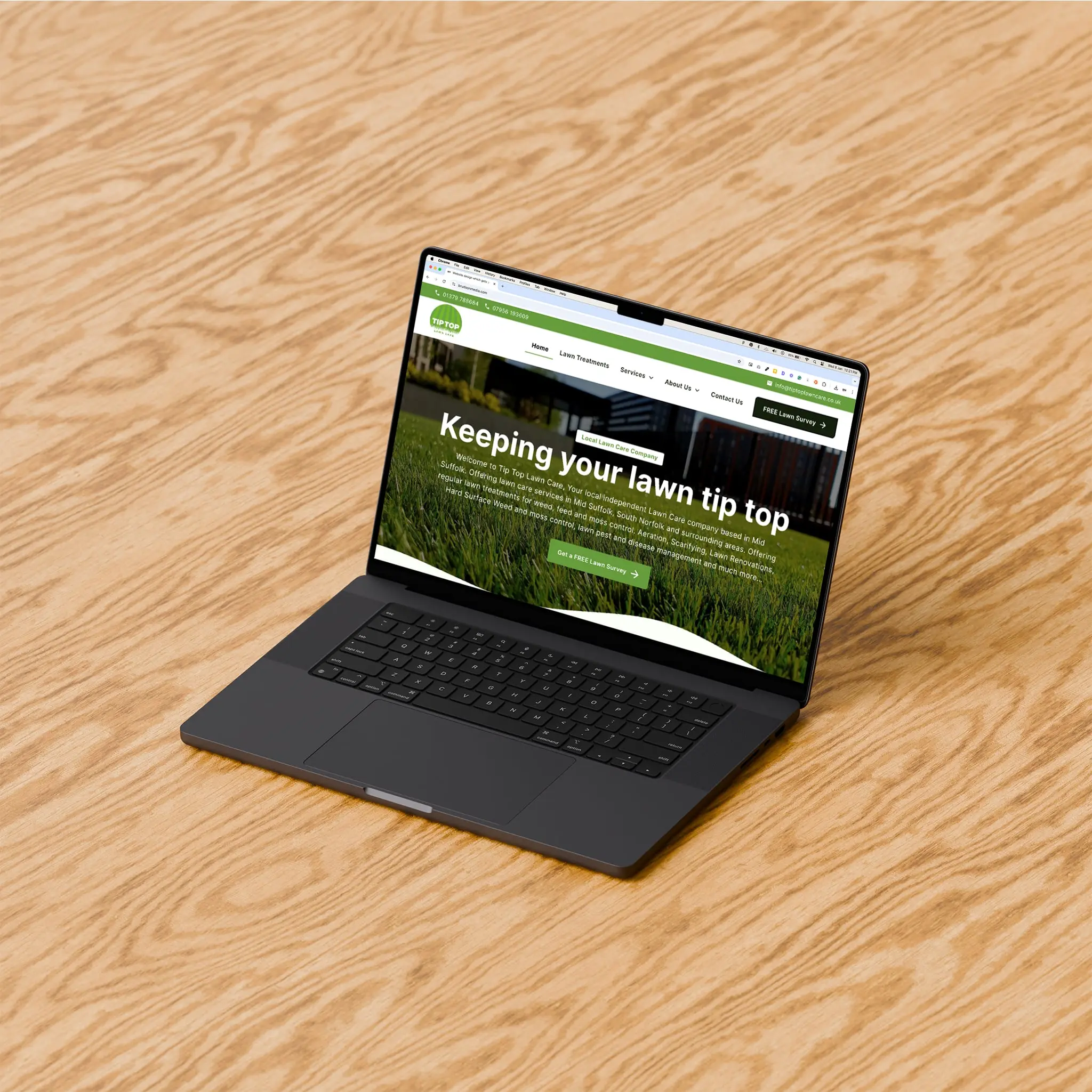 Website on laptop sitting on the floor