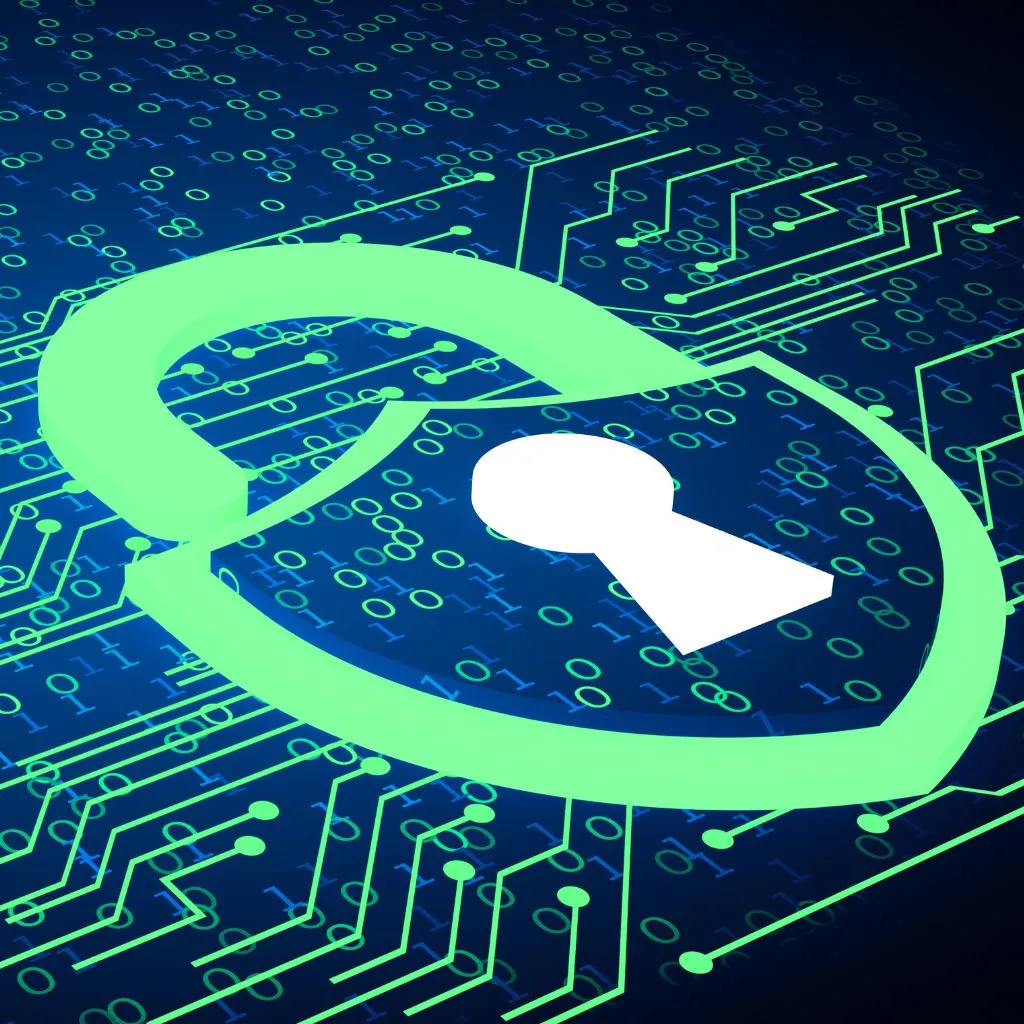 A padlock on a circuit with a green key.