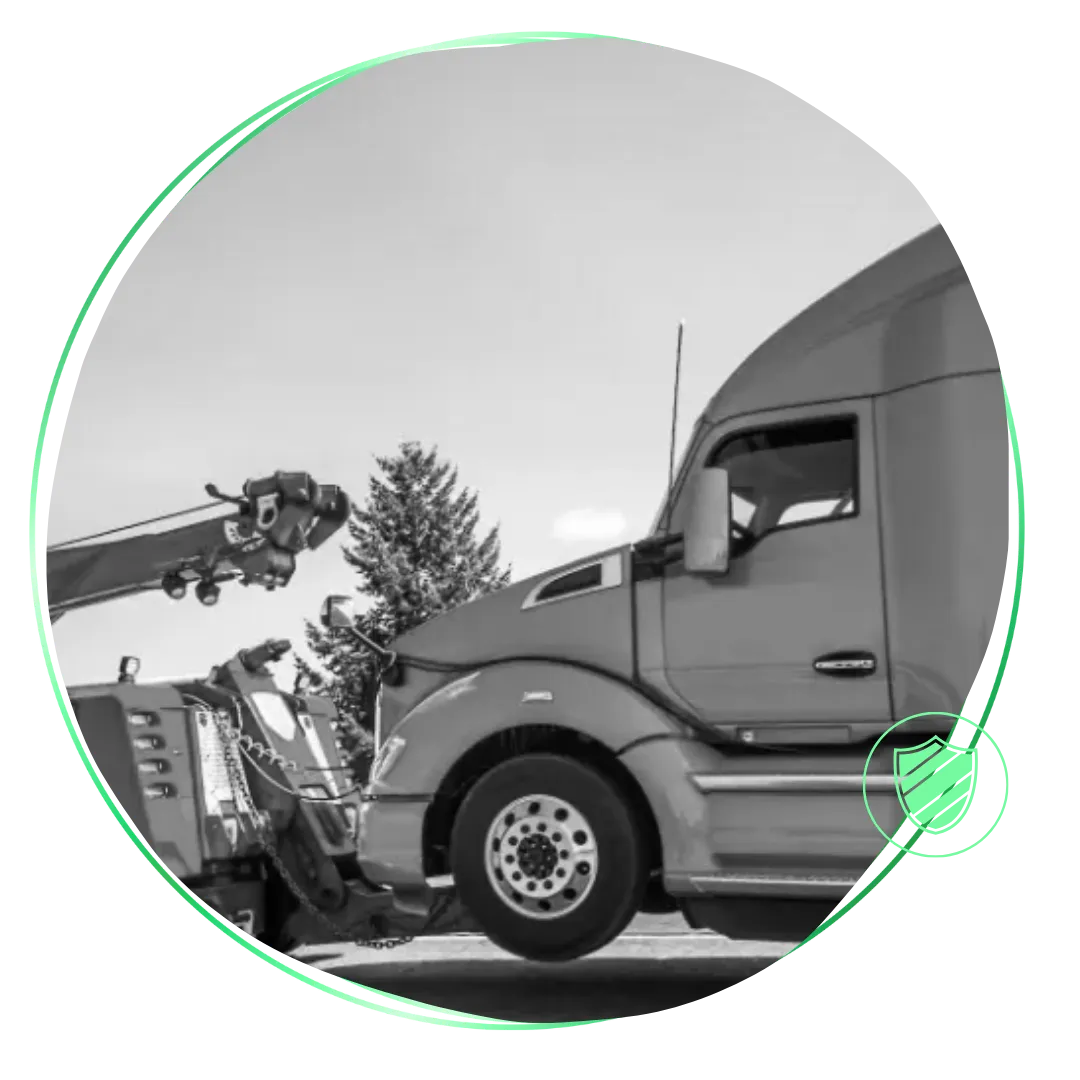 A black and white photo of a semi truck.