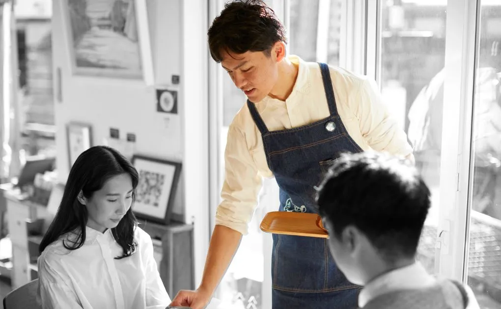 man serving in the restaurant