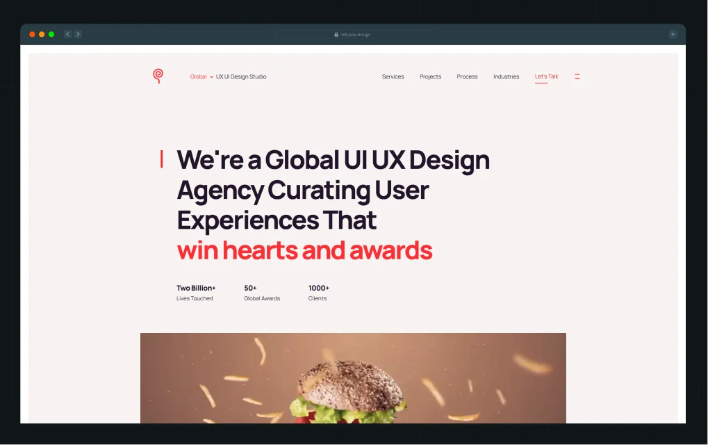 Illustration of Lollypop Design Studio, a Webflow agency in Bangalore's Bommanahalli neighborhood, showing its homepage hero section with stats on lives touched, global awards, and clients served