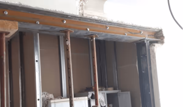 photo de chantier, poutre + trémie (pendant, vue de la poutre))