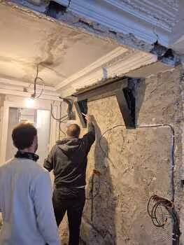 photo chantier suppression d'une cheminée Paris 9 (vue avec recul)