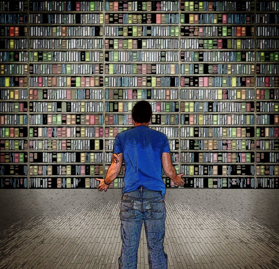 A man facing a wall of books