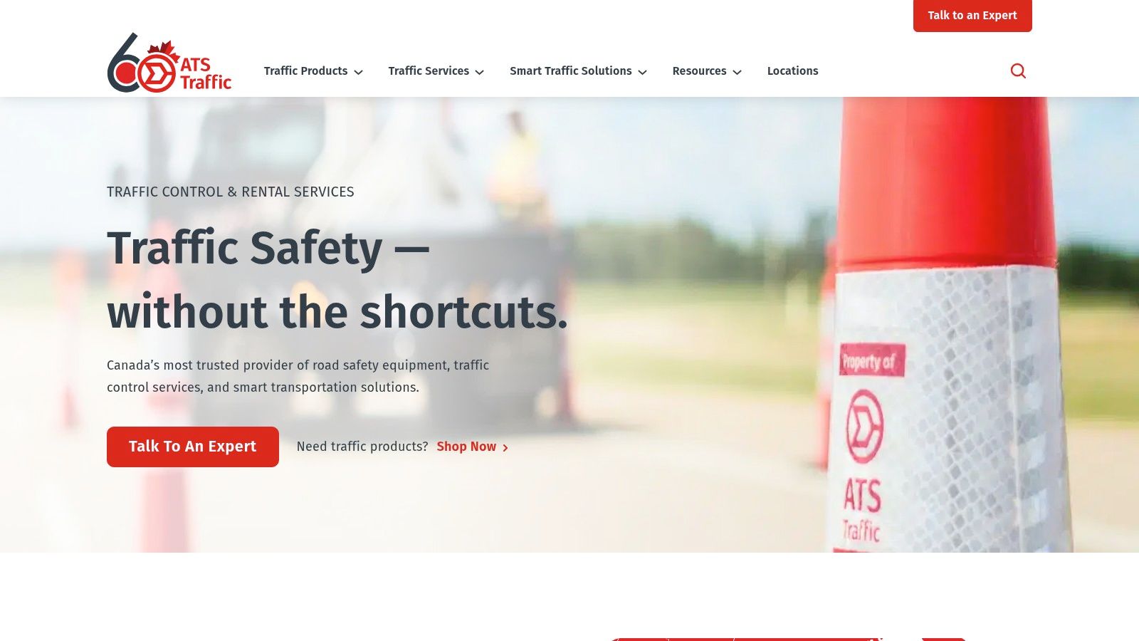 A stack of new, bright orange traffic signs with reflective white arrows, manufactured by ATS Traffic.