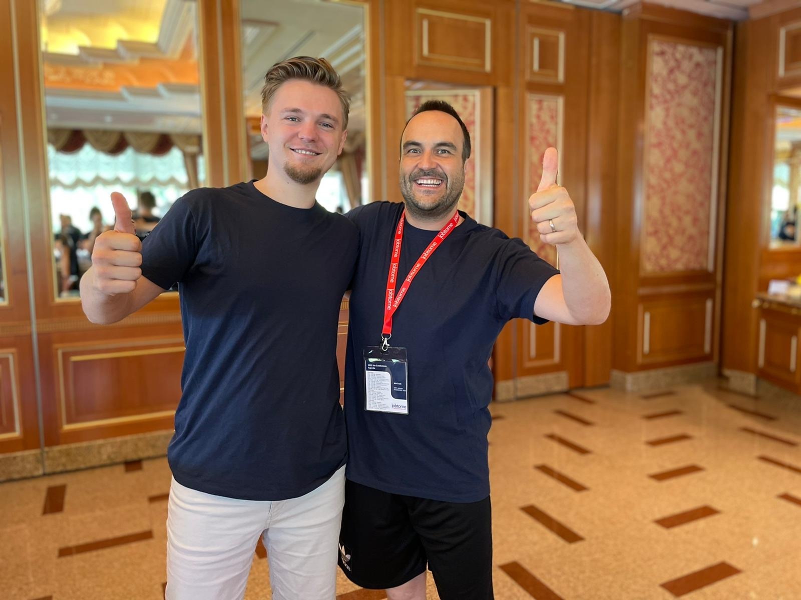 Two guys with thumbs up
