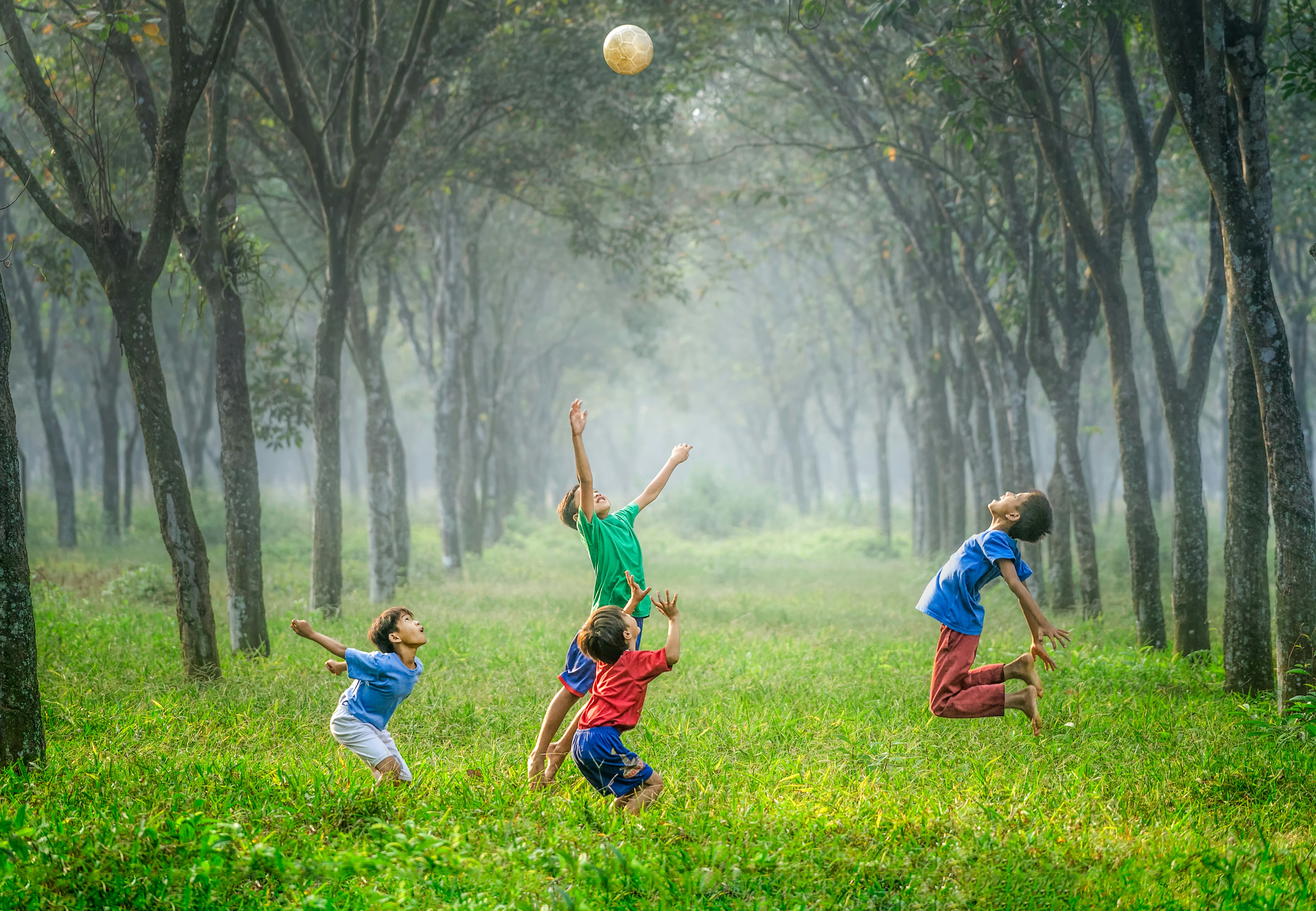 A child playing joyfully outdoors — child support in Ontario is calculated using the Federal Child Support Guidelines based on the paying parent's income.