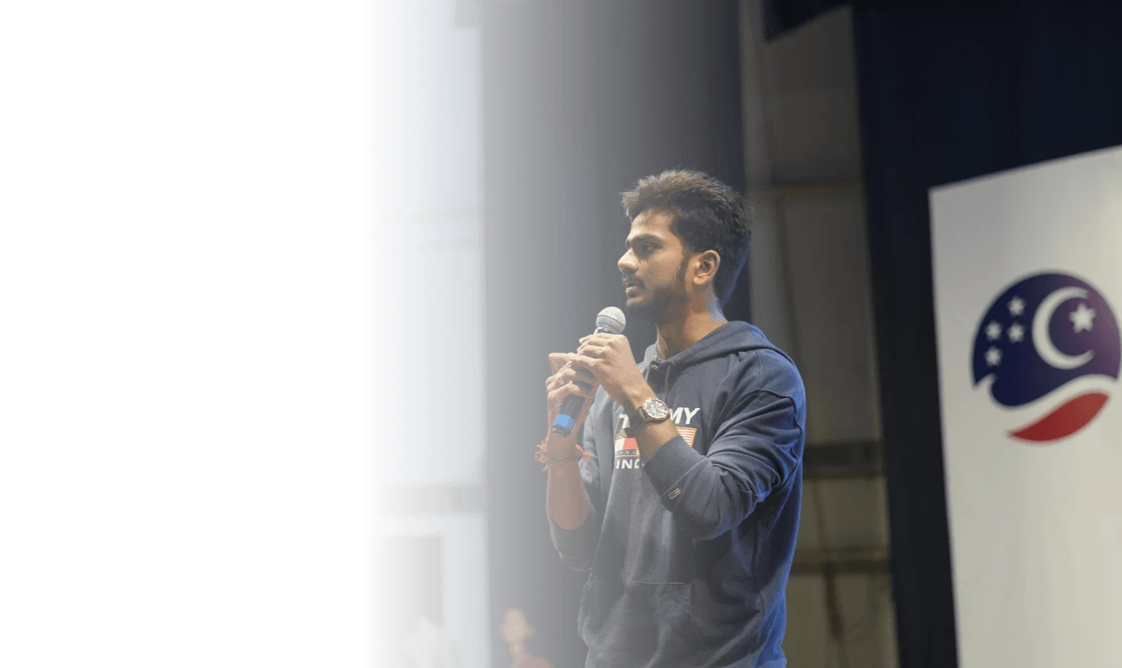 Picture of CEO and Founder, Hari Haran, speaking at an event