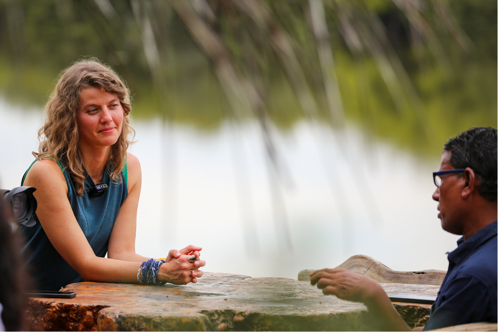 Heather outside with colleague. 