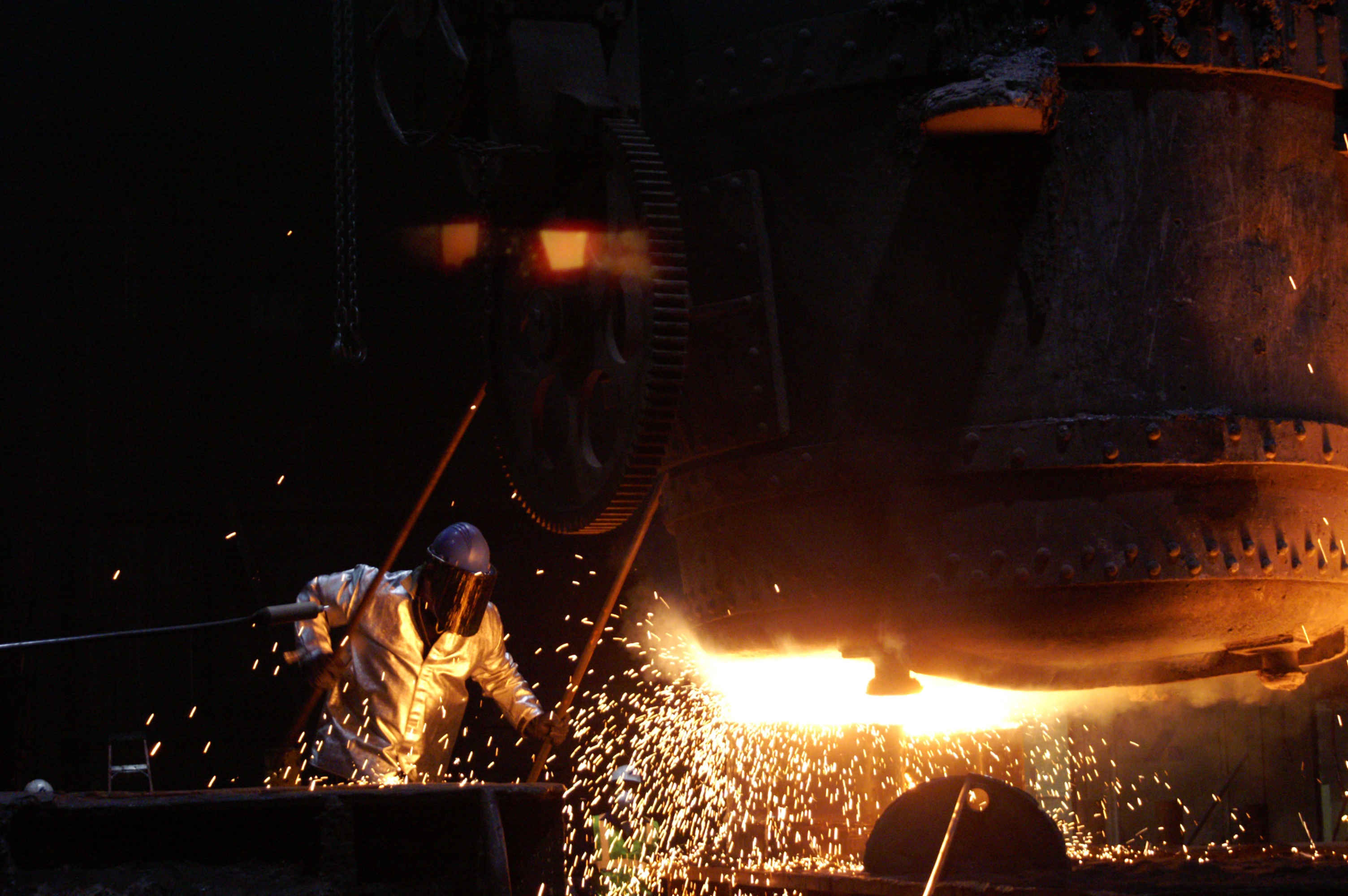 Close up of worker next to a furnace