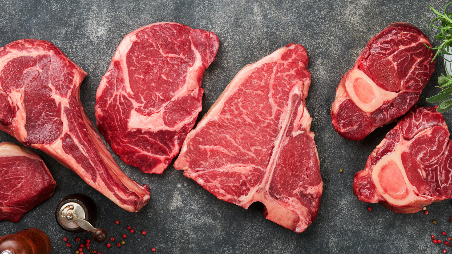 Variety of beef cuts from a half cow including steaks, roasts, and ground beef