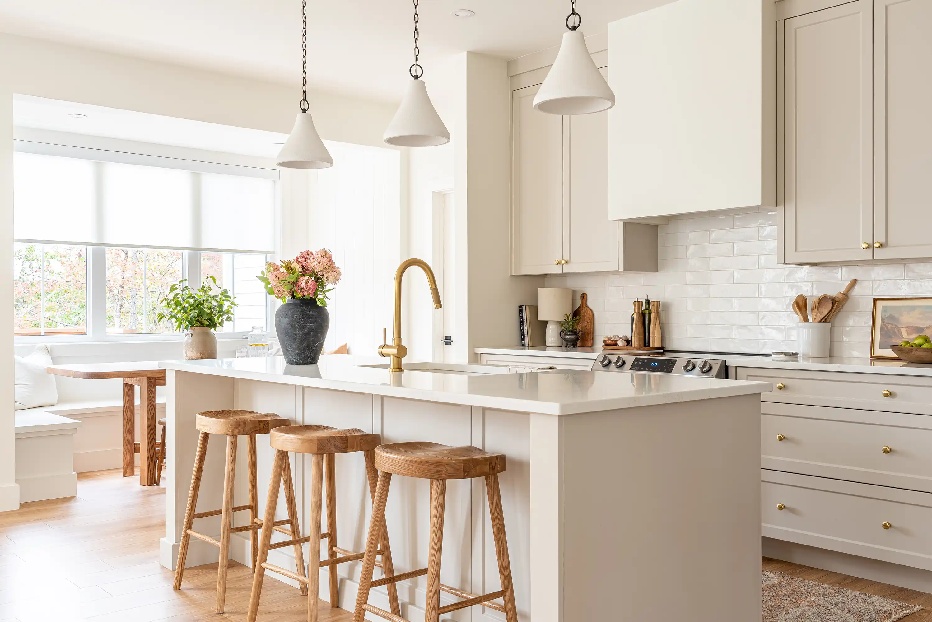 A modern bright kitchen redesign with interior design and styling.