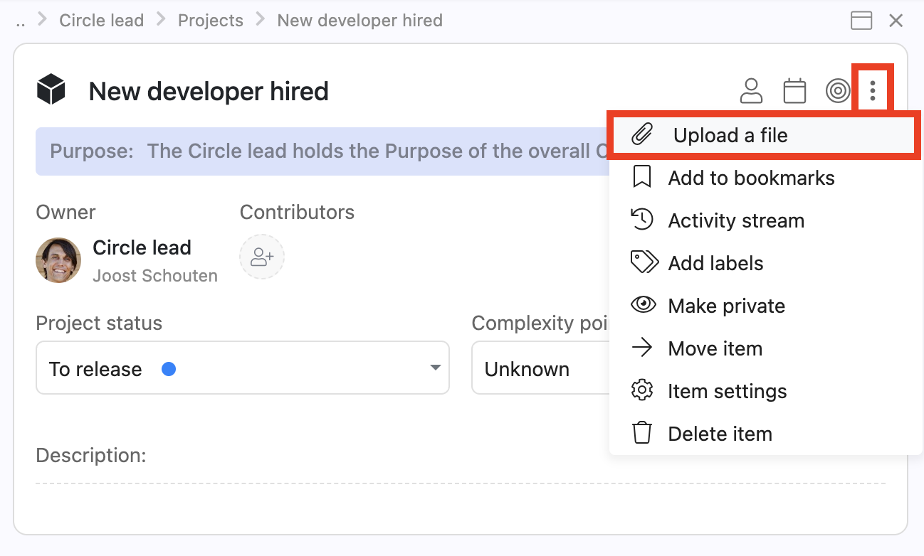 From the item context menu you can select 'Upload a file'