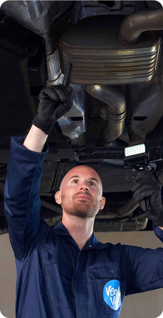 Technician filming the finding under the car