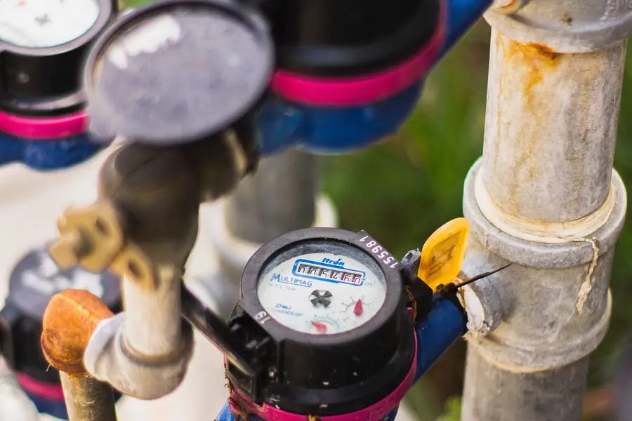 Water meter with seal tag on a pipe installation