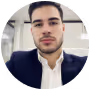 An image of Lucas Kendall, a senior project manager at Quantum Dynamics