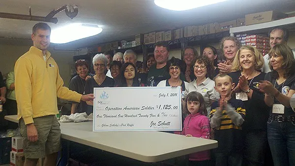 Joe schutt photo giving back