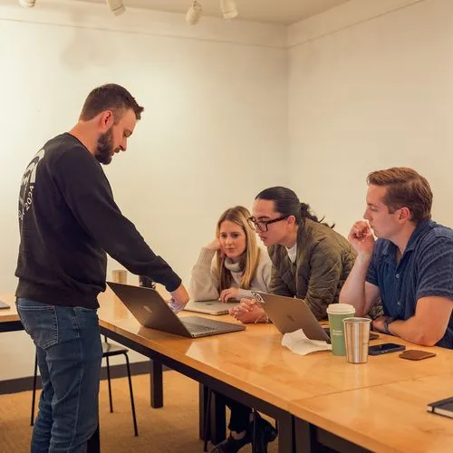 Group of Proof employees working together