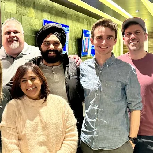 Group of Proof employees at an event