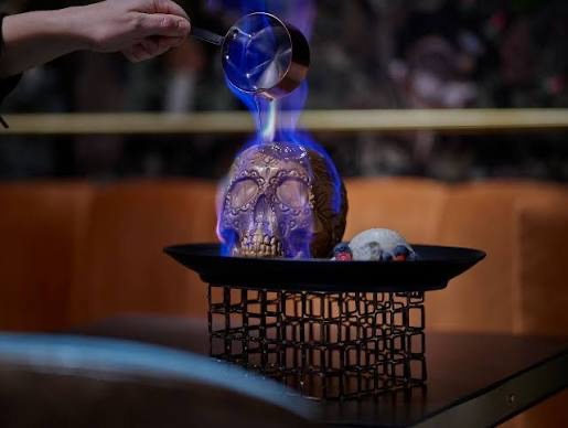 A flaming sugar-skull cocktail