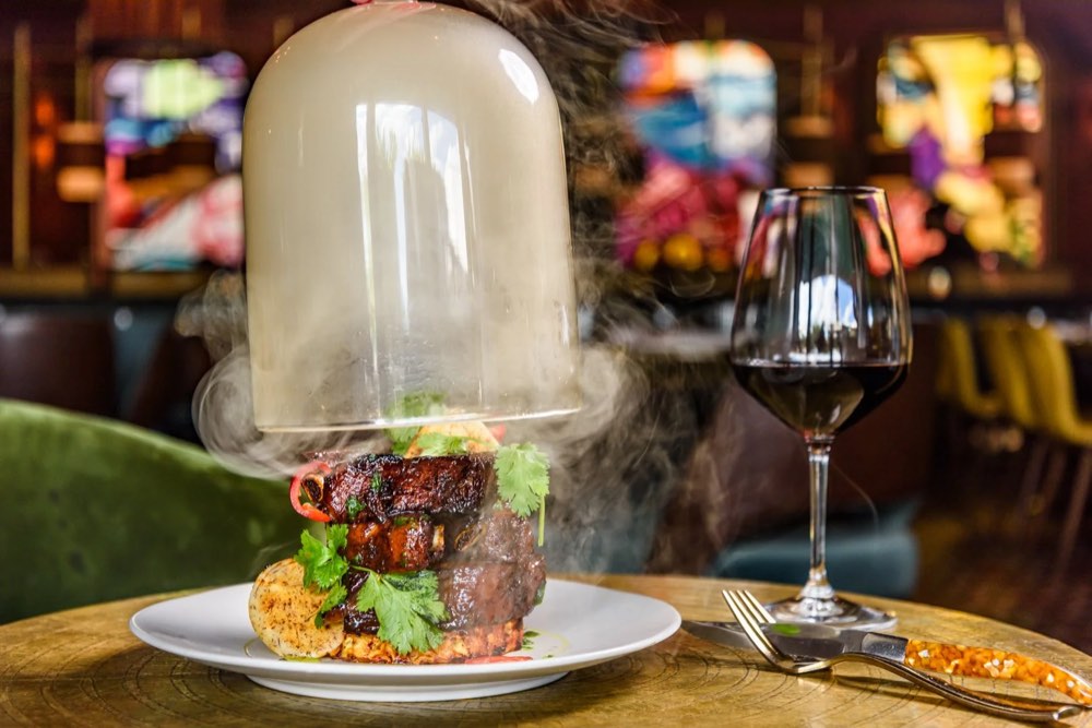 Short rib under a smoking glass cloche