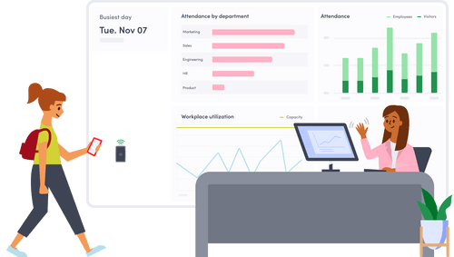 A woman walking past a computer screen with a woman sitting at the desk.