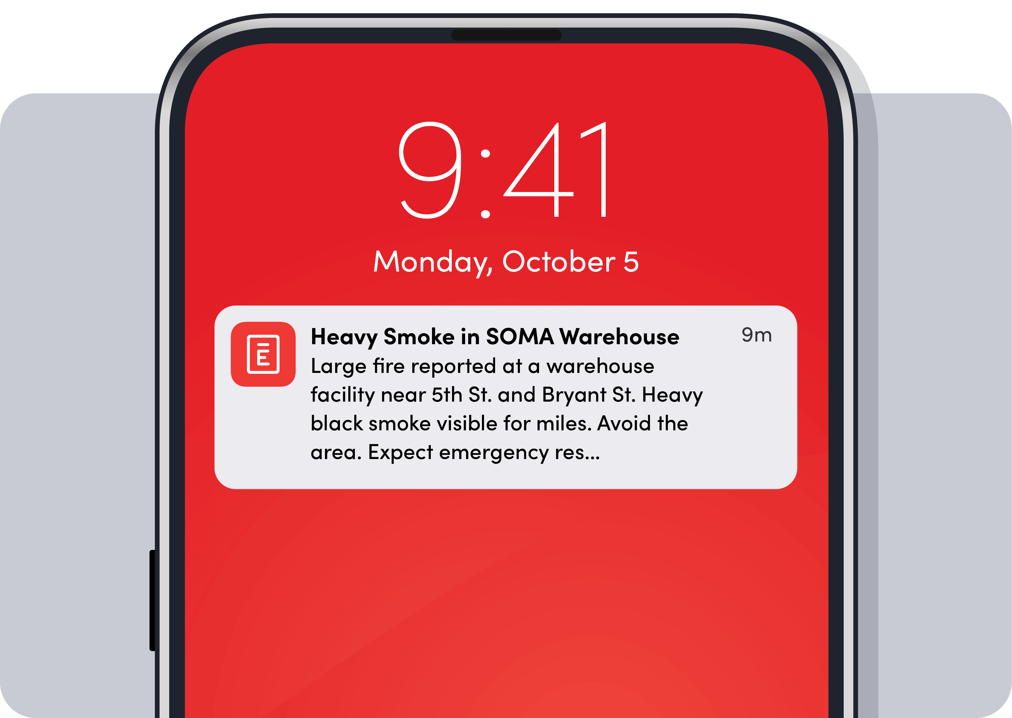Phone notification: heavy smoke at SOMA warehouse, large fire near 5th St. and Bryant St., avoid area.