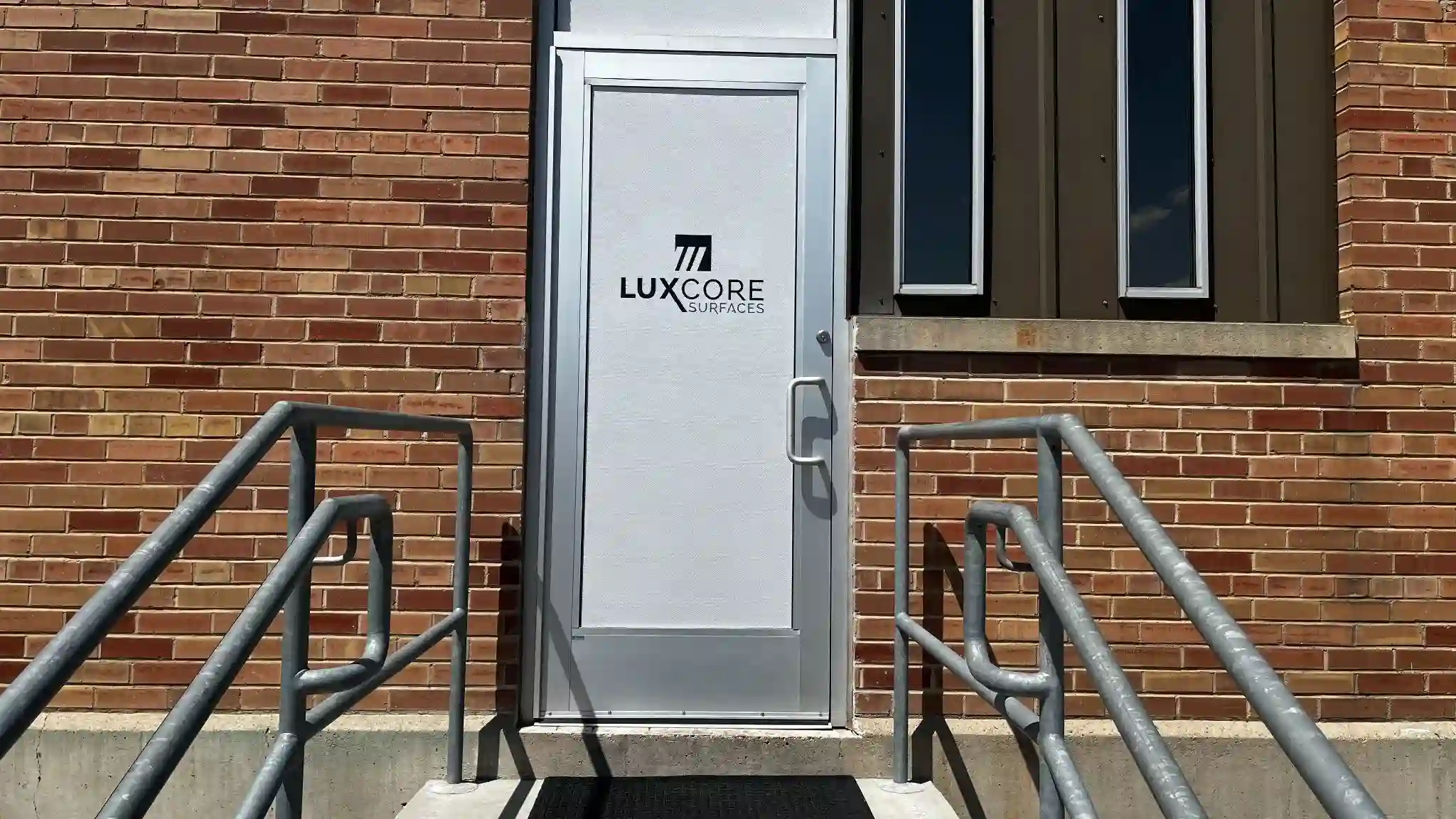 LuxCore Surfaces showroom entrance in Ogden Utah for quartz countertop and slab selection