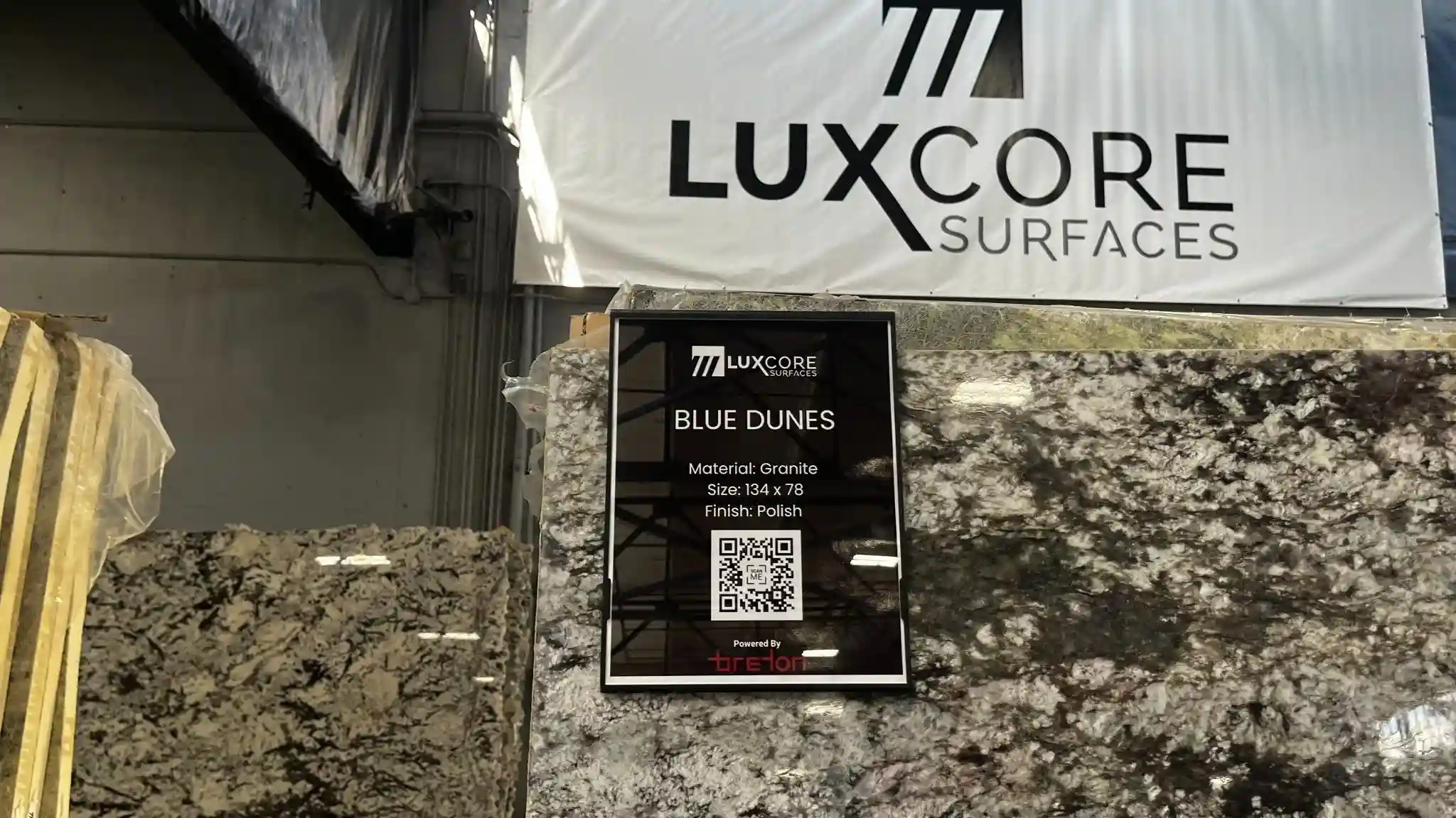 Full natural stone slab displayed at LuxCore Surfaces to show pattern, movement, and scale beyond a small sample