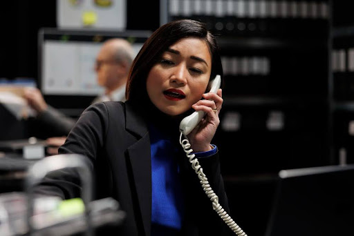 A consultant making a phone call