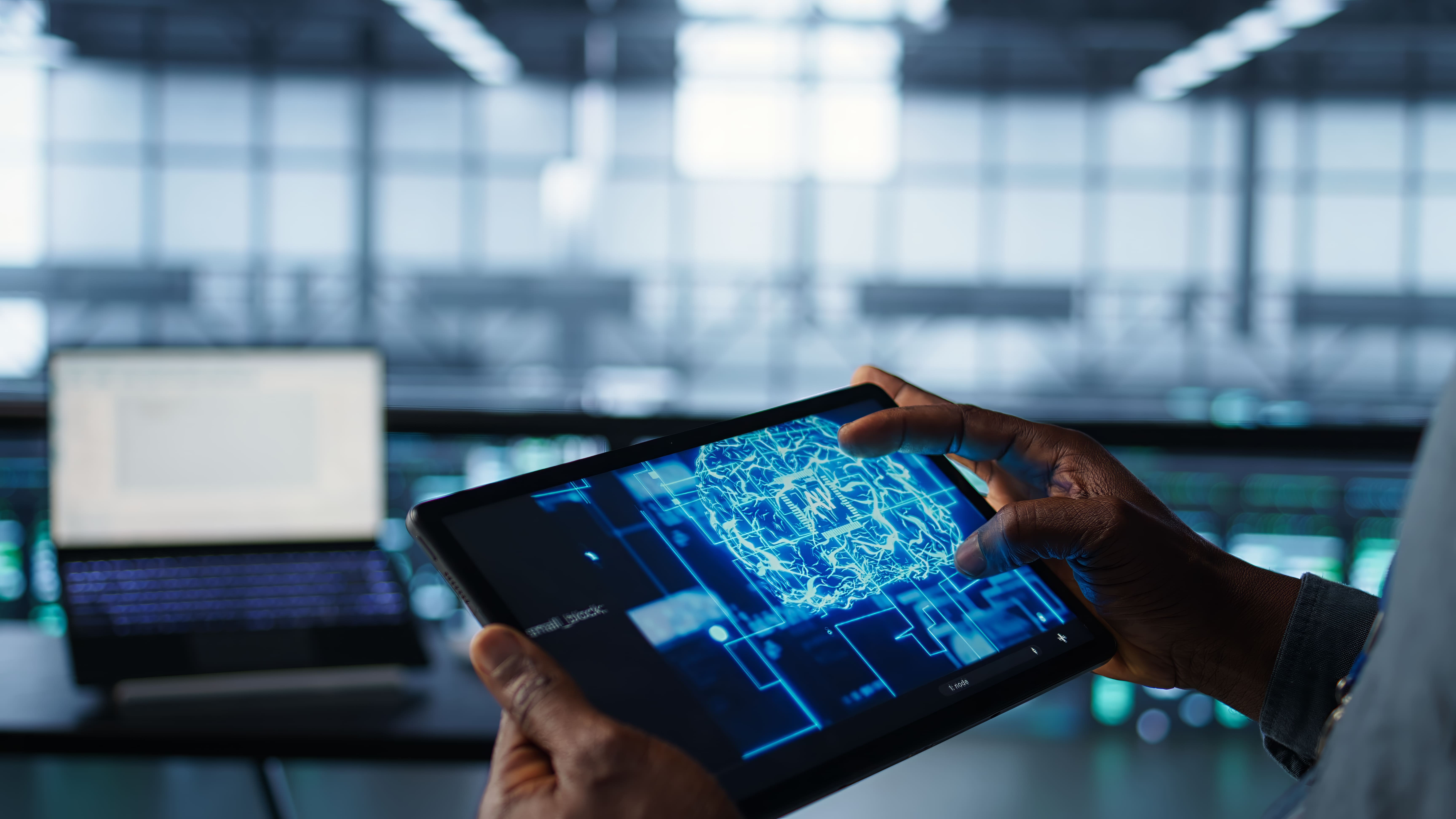 Professional using AI workflow automation platform on digital tablet