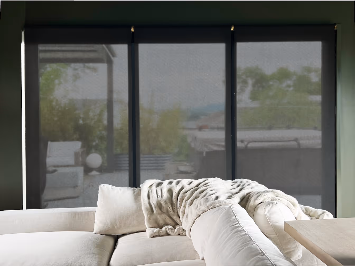 Motorized solar shades for sliding glass doors with UV protection