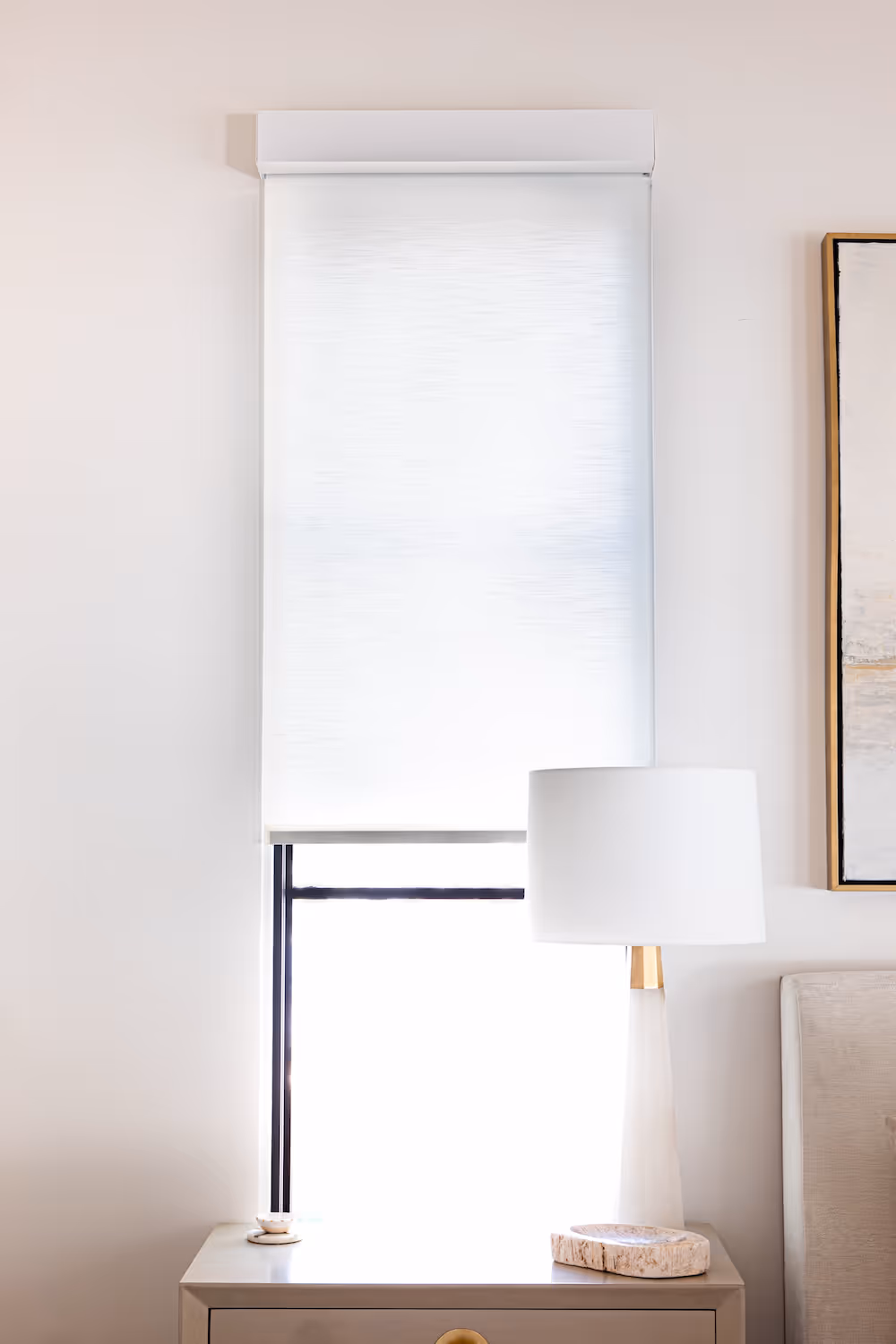 Professional window treatment installation of motorized blinds