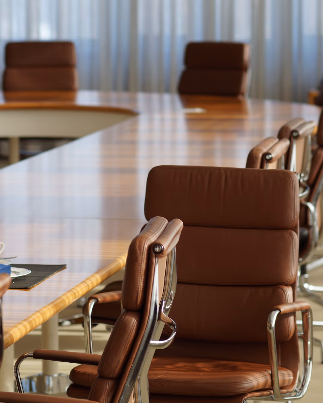 Board room with empty chairs