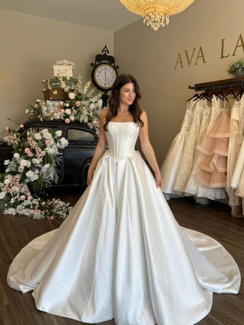 Bride trying on wedding dresses Greenville SC at wedding dress shop Greenville SC