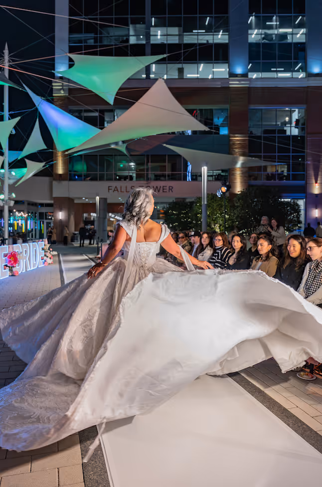 Model presenting couture bridal gown during Ava Laurénne Bride runway event