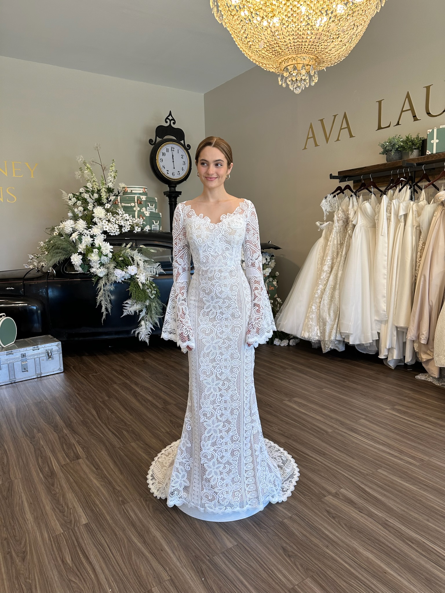 Modern lace wedding dress with long sleeves at Greenville bridal boutique