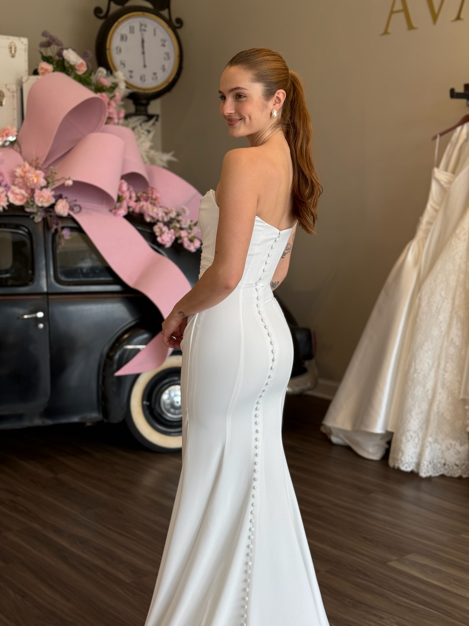 Romantic fitted lace wedding dress with illusion bodice and long sleeves in South Carolina bridal boutique