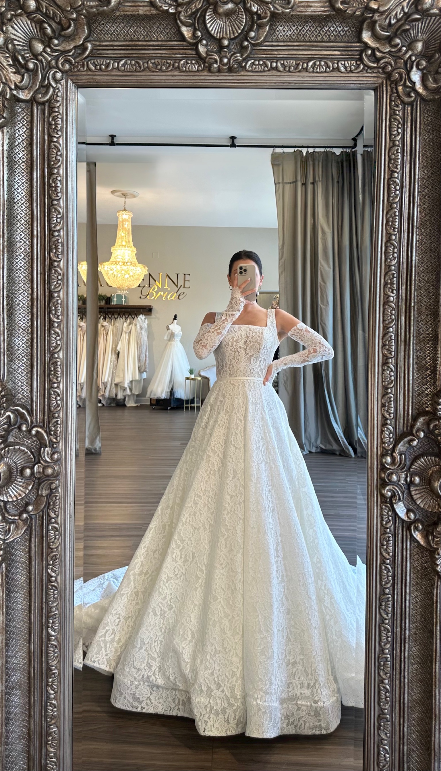 Elegant long sleeve square neckline wedding dress with structured bodice and minimalist silhouette