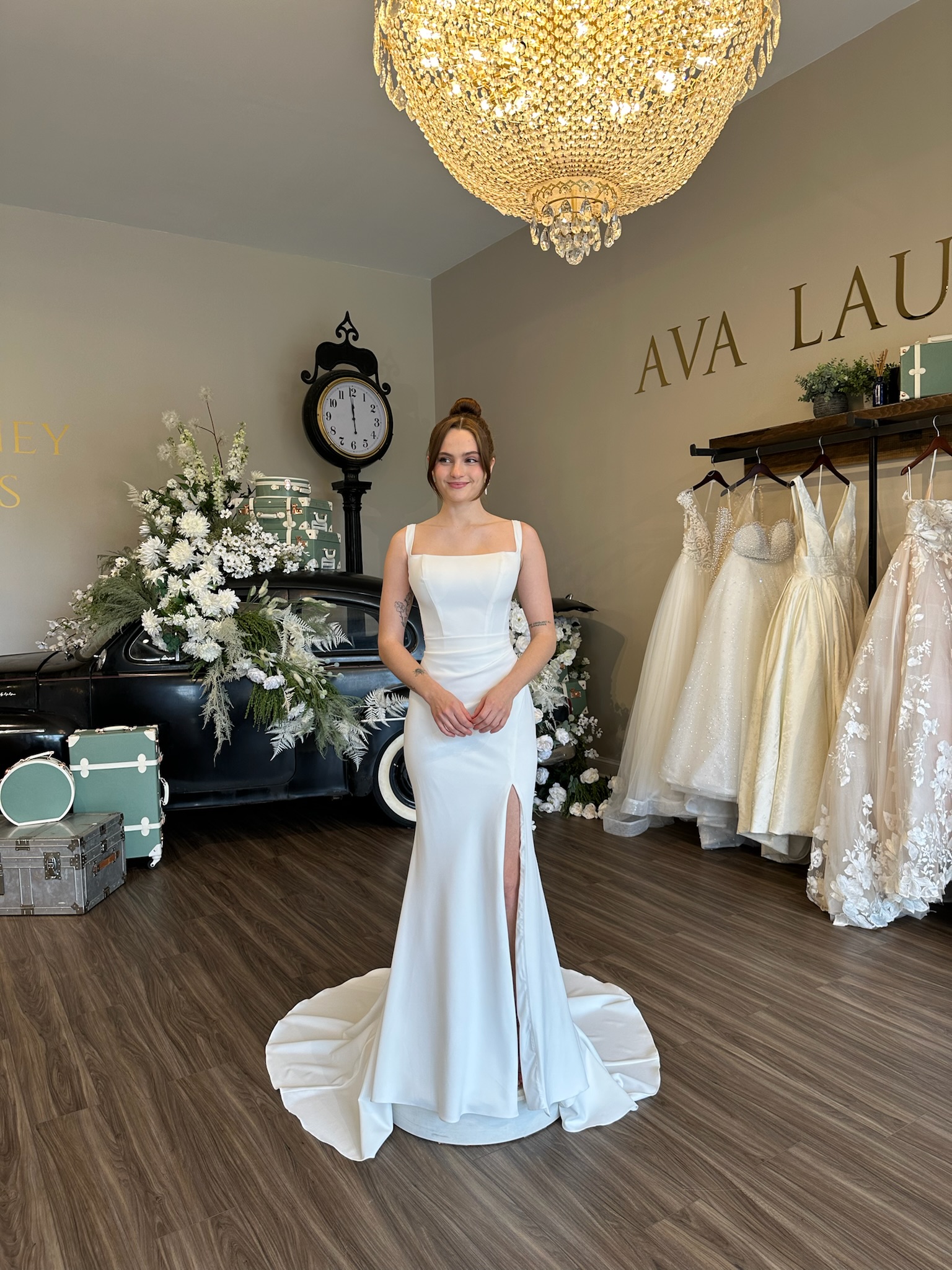 Romantic lace square neckline ball gown wedding dress with matching lace gloves at Ava Laurénne