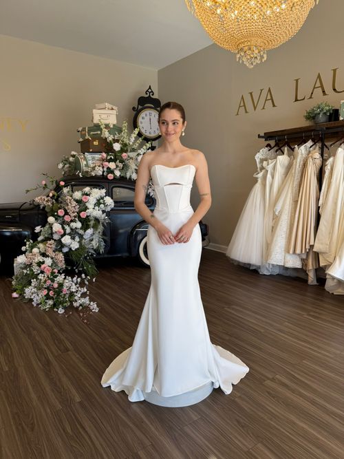 Sweetheart neckline wedding dress with floral lace appliqués at Ava Laurénne Bride in South Carolina