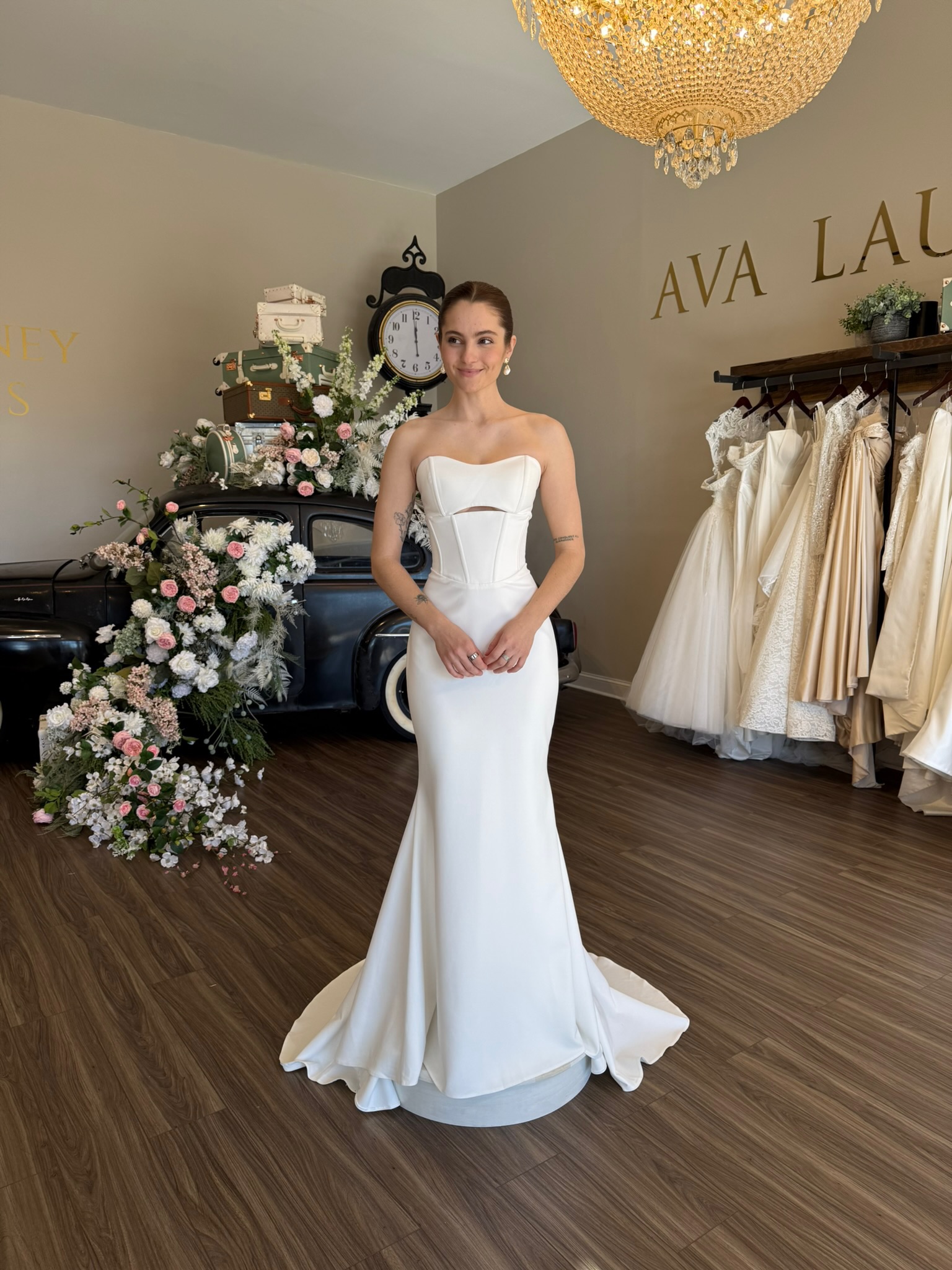 Sweetheart neckline wedding dress with floral lace appliqués at Ava Laurénne Bride in South Carolina