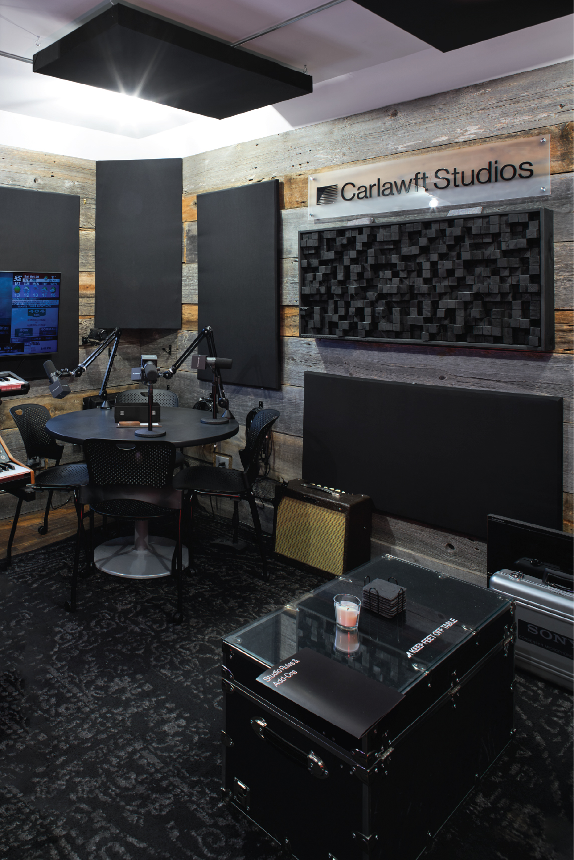 Recording studio with podcast table and mics