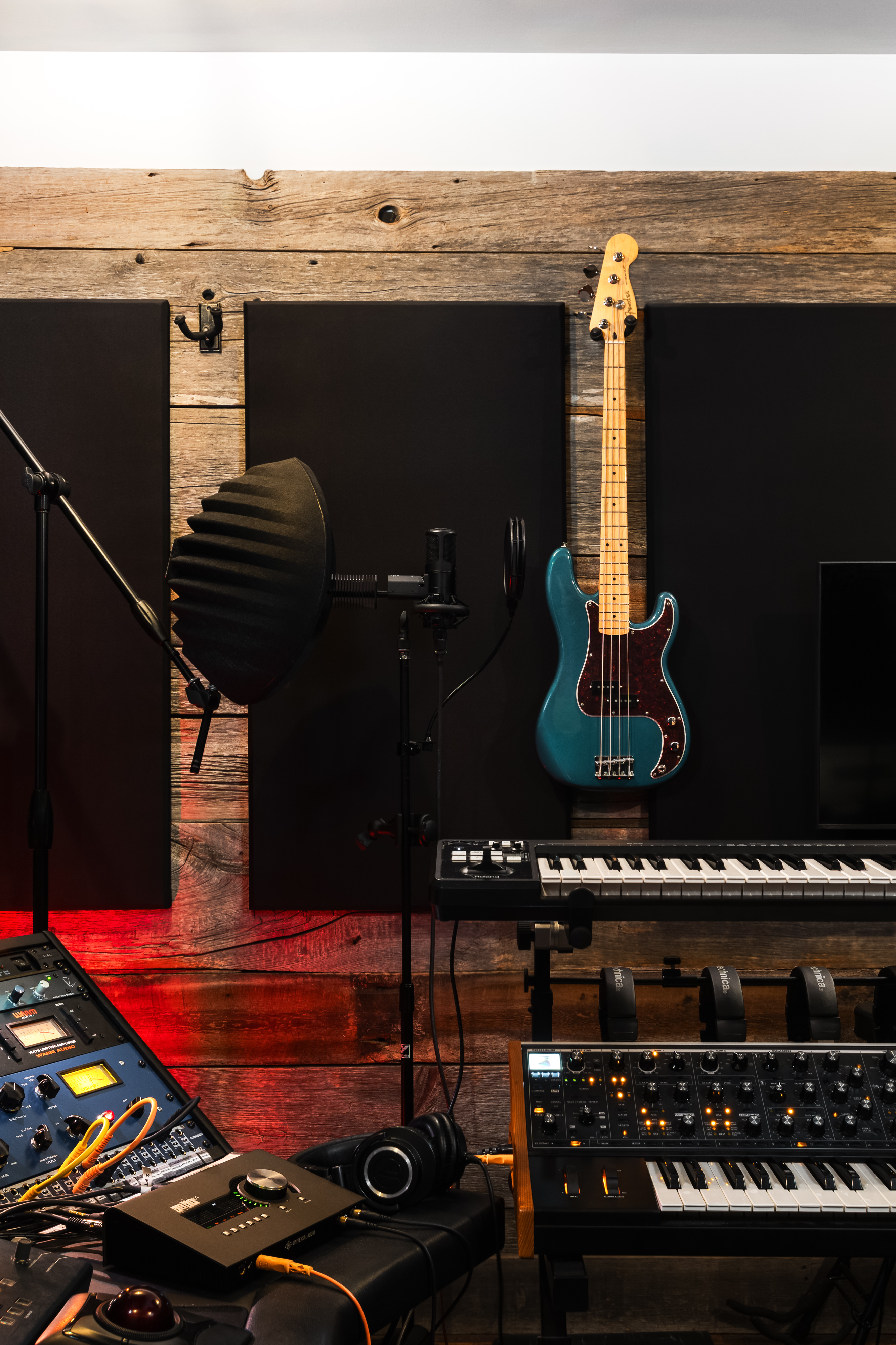 Recording Studio with C800G, bass guitar, and keyboards