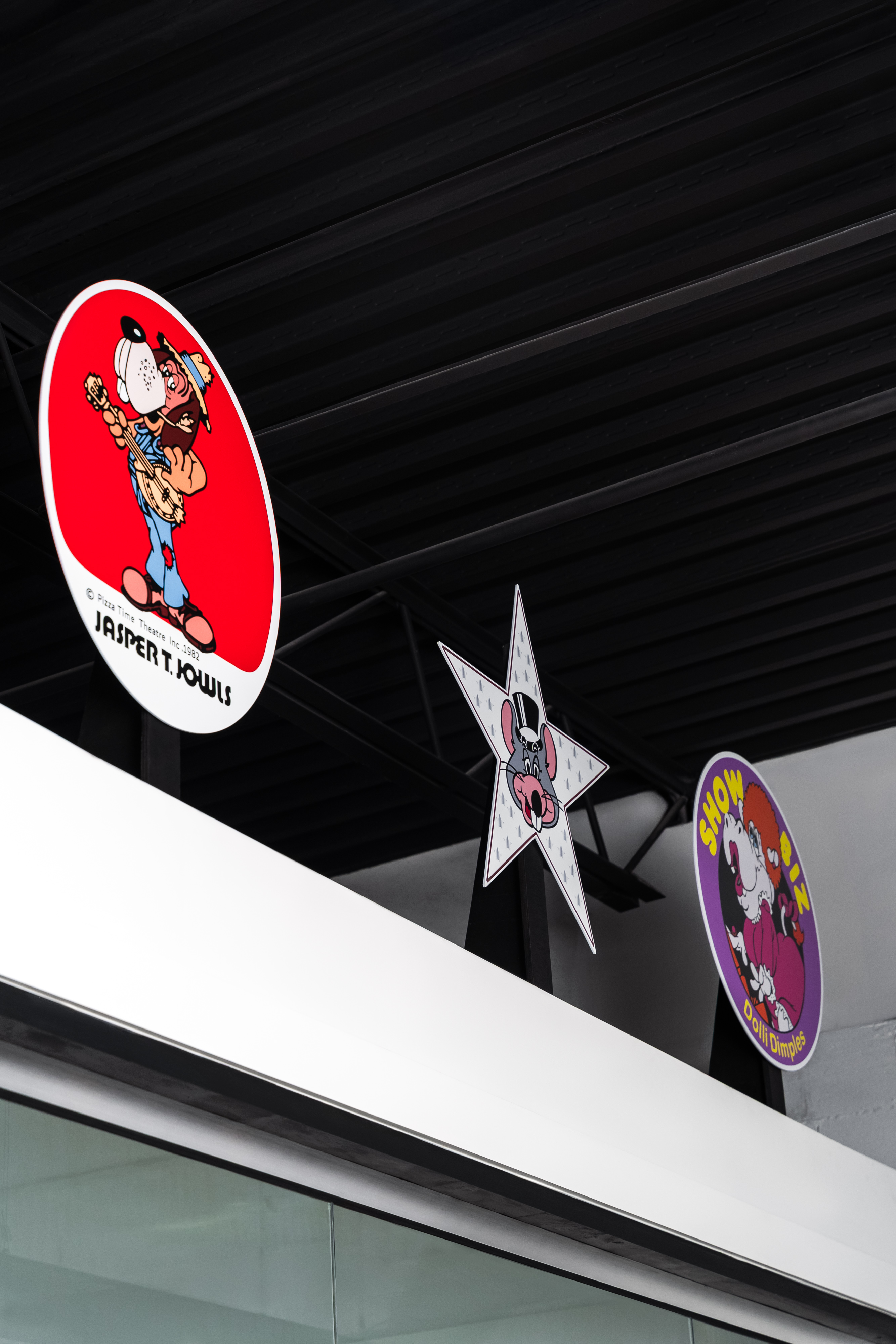 Vintage Chuck E. Cheese signs